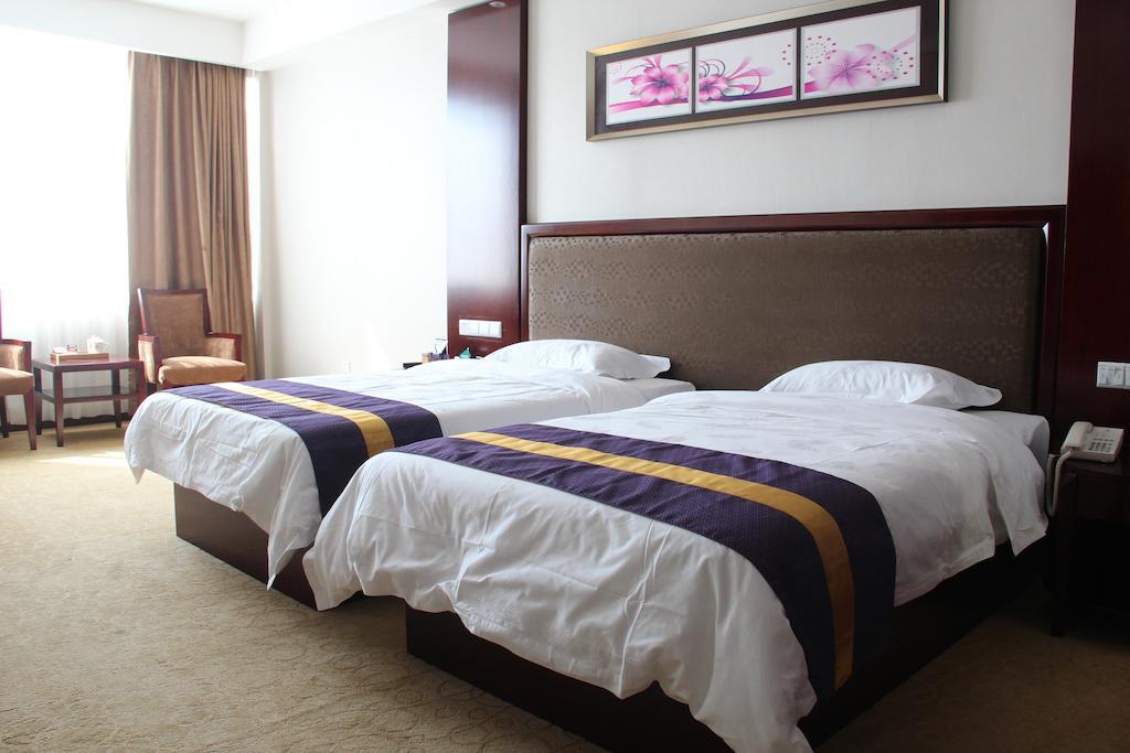Zhuhai Platinum Holiday Hotel Номер фото